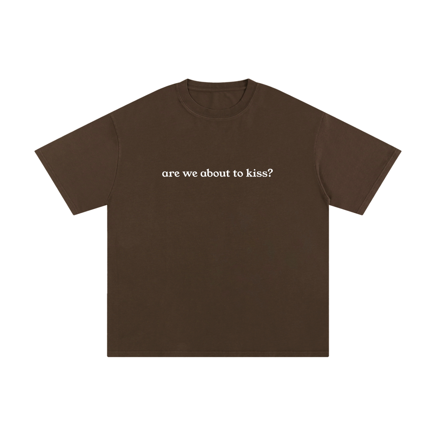 Brown t-shirt with white text 'are we about to kiss?' on a white background